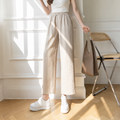 Pantalon femme large, taille haute et boutons — visuel retouché par IA à partir de la photo fournisseur
