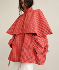 Veste-cape rouge à carreaux