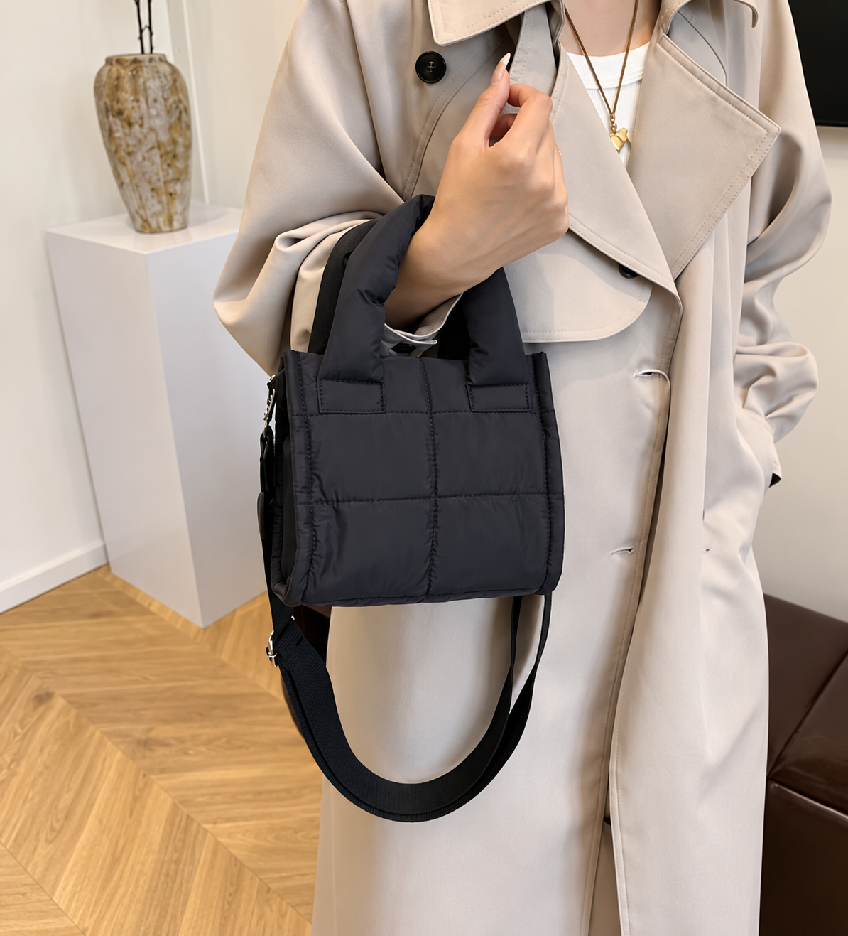 Petit sac noir matelassé à bandoulière