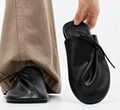 Mules noires à lacets et pli central