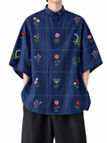 Chemise bleu marine à quadrillage et fleurs — vue principale sur fond blanc
