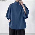 Chemise bleue à col montant et manches courtes